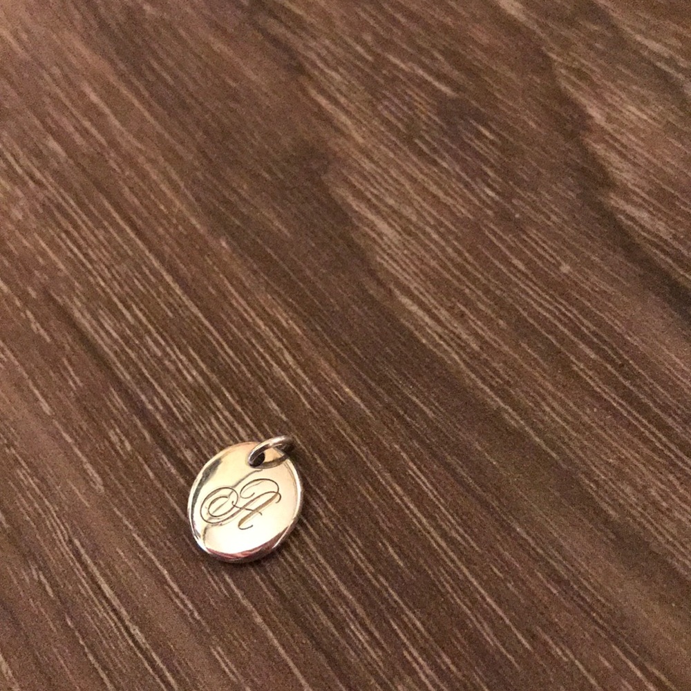 Never been used Tiffany & Co “A” charm